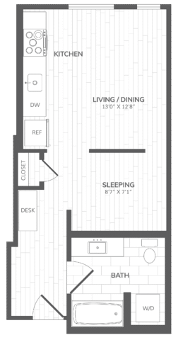 Floor plan of a studio apartment showing a kitchen, living and dining area, sleeping nook, bathroom with a tub, and a small desk area.